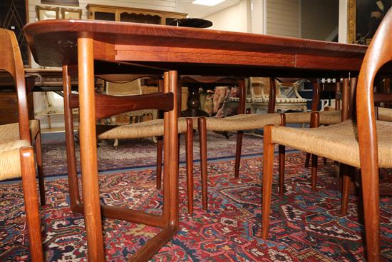 A Danish teak extending dining table designed by Peter Hvidt & Orla Mølgaard Nielsen for France and Daverkosen and ten Dutch manufactur